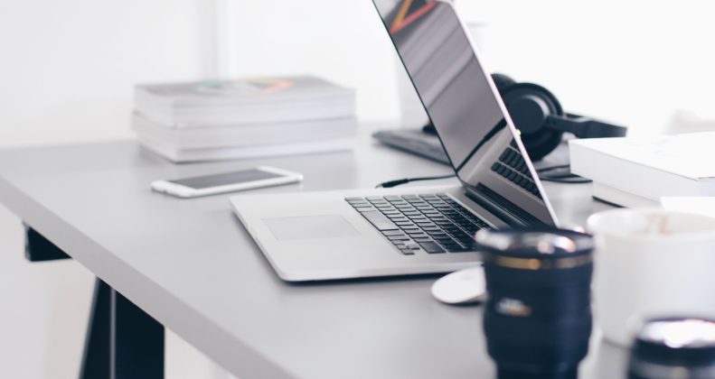Free Gray Laptop on Table Top Stock Photo